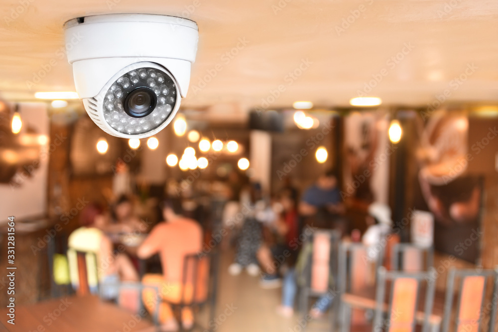 CCTV system security inside of restaurant.Surveillance camera installed on ceiling to monitor for protection customer in restaurant